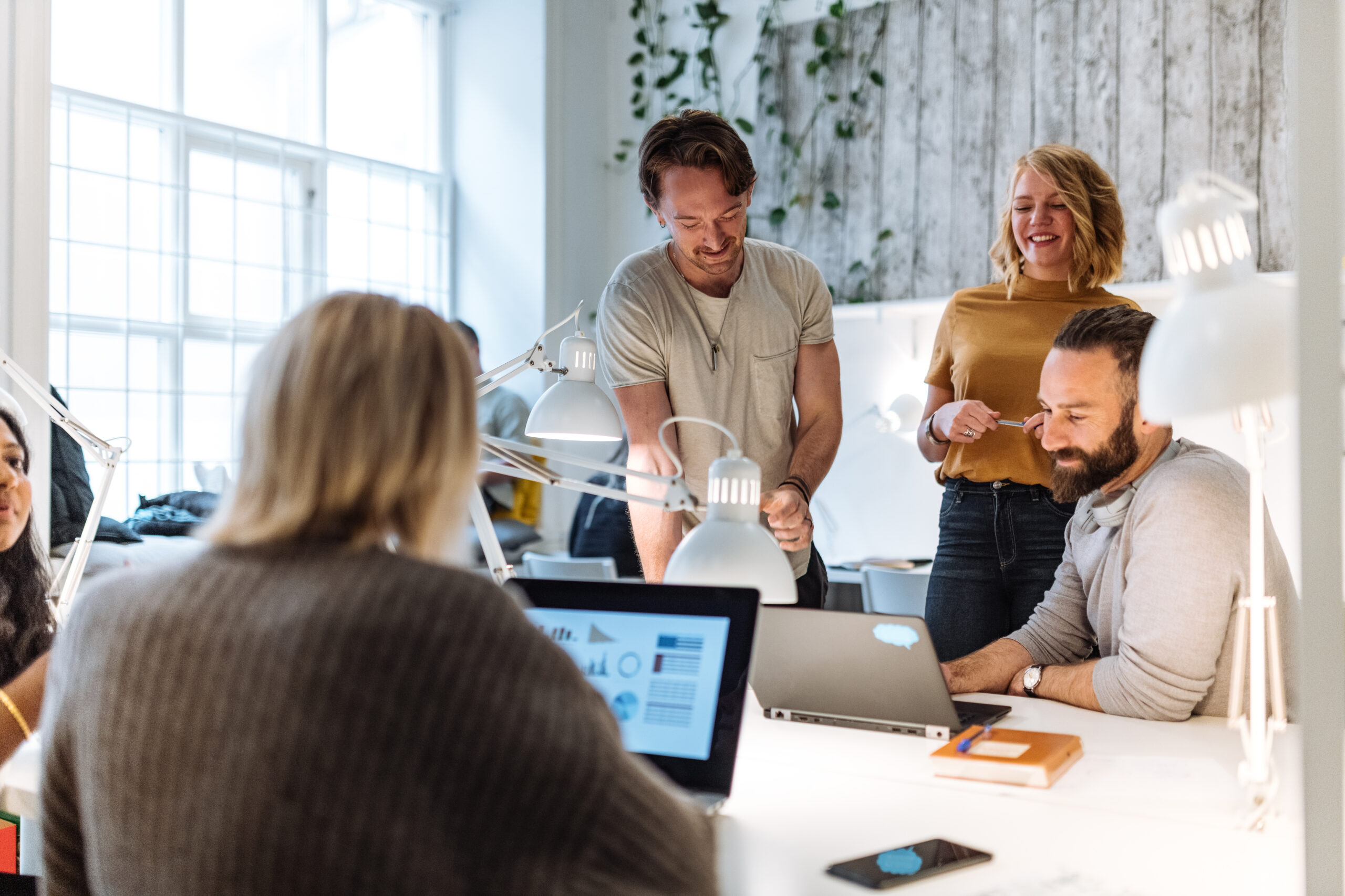 Entrepreneurs Working In Modern Office And Dealing With Financial Decisions